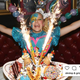 Jojo Siwa posing with a huge dessert platter shooting sparklers